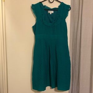 Size 10 dress with pockets! Beautiful color and polka dot detail.